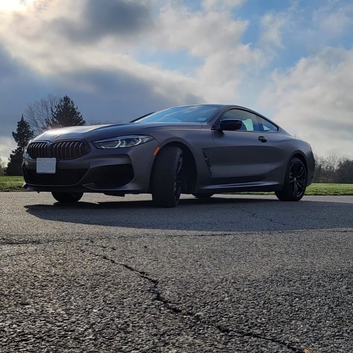 BMW M850I 2021 Full wrap with (Dark Satin Grey) Avery Dennison and Full Blackout Package