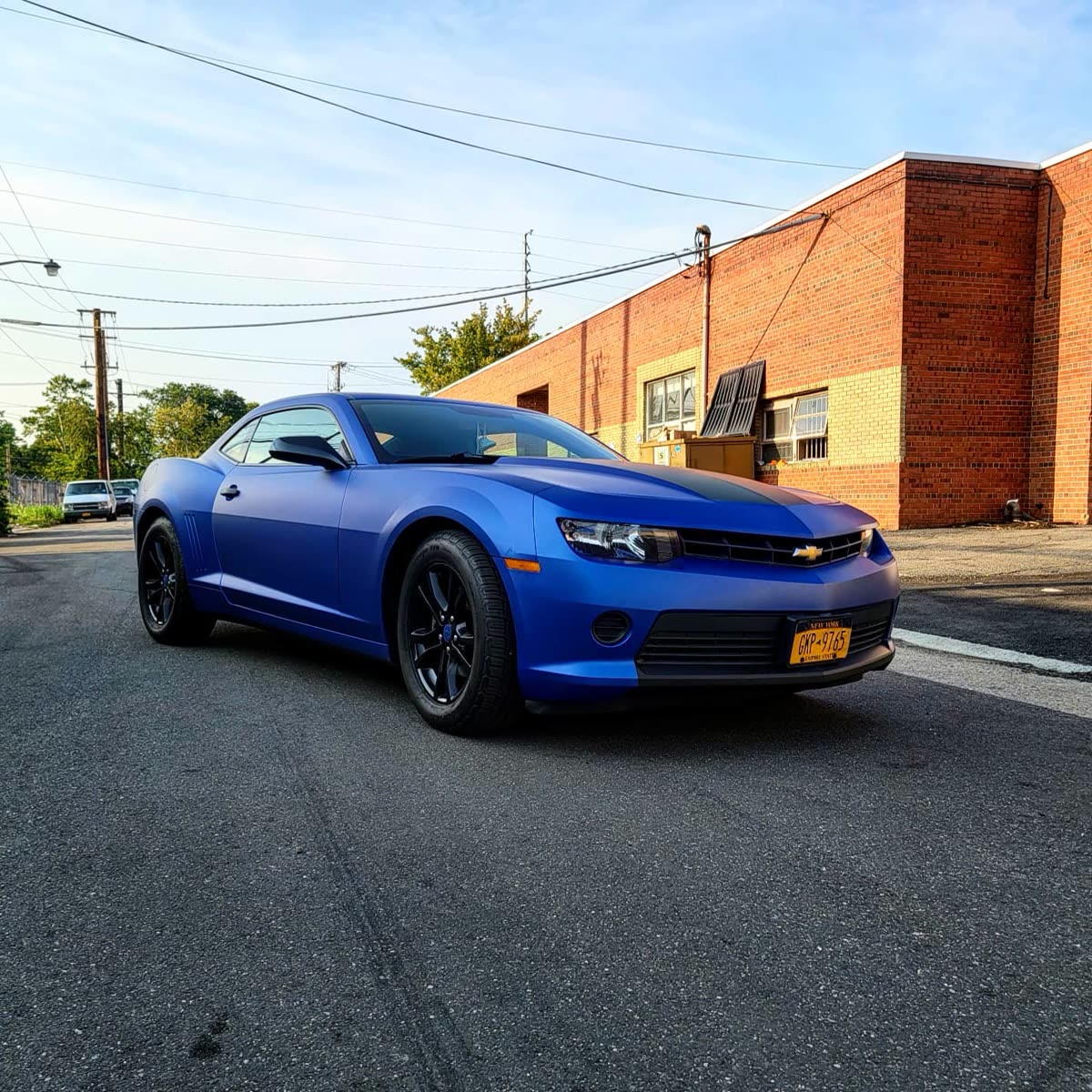 Camaro Fully wrapped using 3M Matt Slate Blue with Matt black stripe and accent.