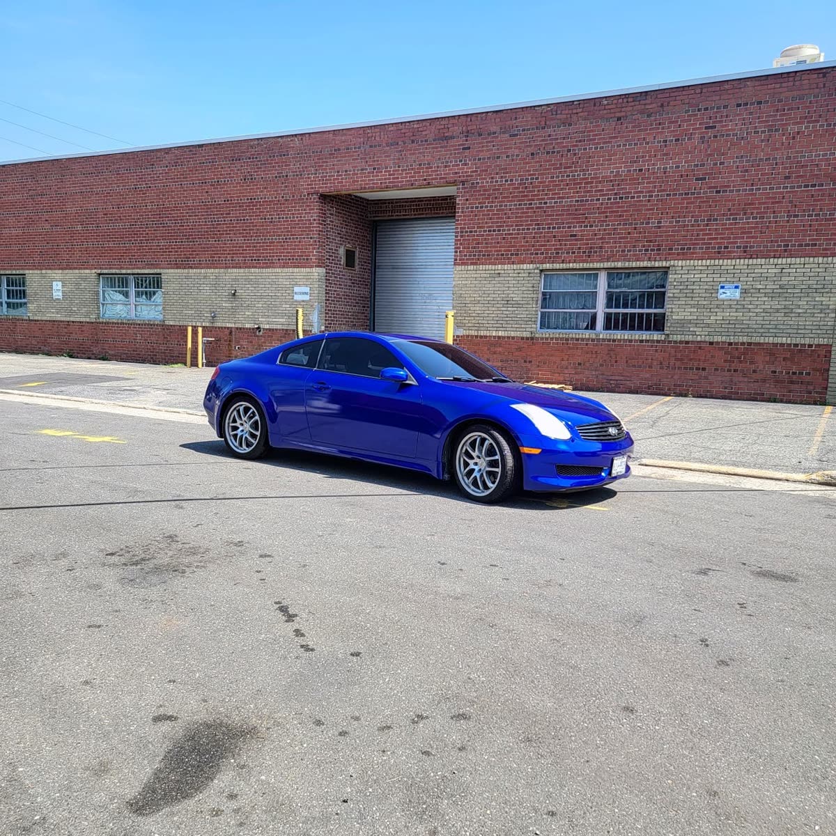Infinite G35 Fully Wrapped using 3M 2080 Gloss Raspberry Blue. (Car original color is white)