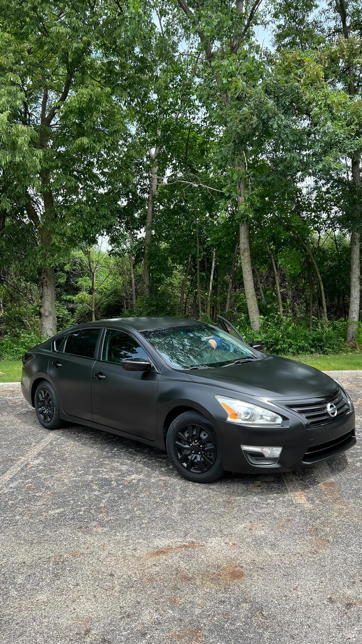 Satin black, chrome delete, ceramic coated all around.